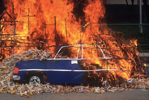 SINGAPORE, Religion, "Burning offerings, including an image of a car on the first anniversary of a death.  "