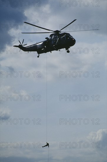 TRANSPORT, Air, Helicopter, Soldier absailing from Sea King helicopter