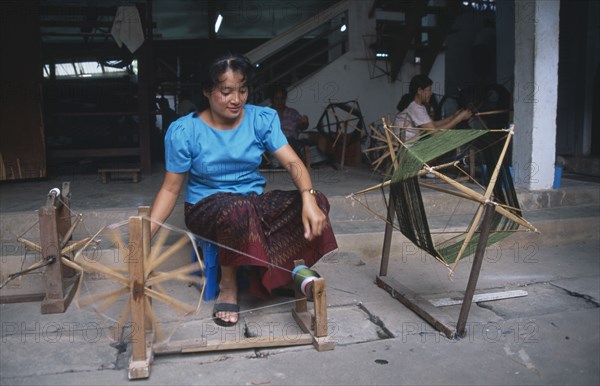LAOS, Vientiane, Traditional silk weaver