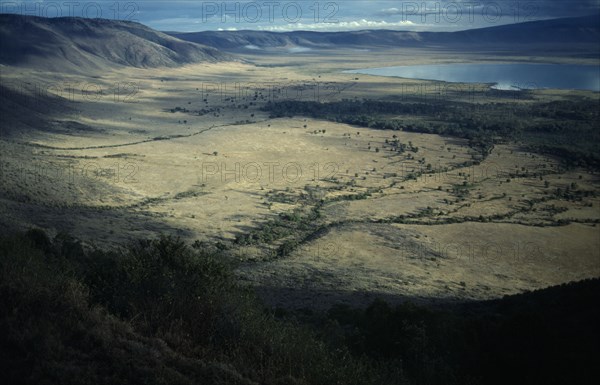 TANZANIA, Ngorongoro Crater , View from the rim of volcanic crater across valley floor and Lake Magadi.
