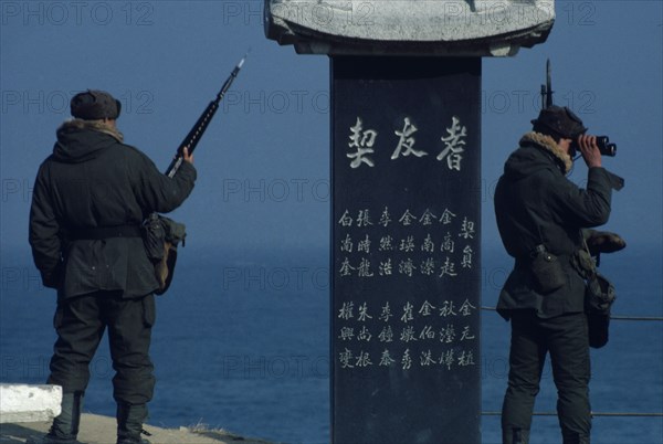 SOUTH KOREA, Border, Guards at east coast look out point watching for North Koreans attempting to infiltrate by sea.