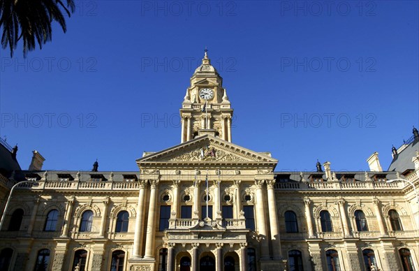 SOUTH AFRICA, Western Cape, Cape Town, Angled view looking up at the neo classical City Hall facade and clock tower