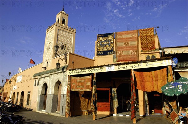 MOROCCO, Marrakech, Carpet shop with rugs hanging outside