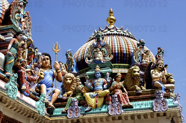 SINGAPORE, Central, Chinatown, Sri Mariamman Temple. Detail of brightly coloured Hindu carvings dating from 1862