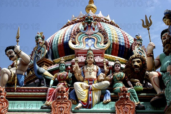 SINGAPORE, Central, Chinatown, Sri Mariamman Temple. Detail of brightly coloured Hindu carvings and dome dating from 1862