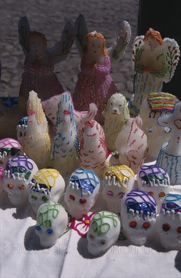 MEXICO, Michoacan, Patzcuaro, Day of The Dead sugar skulls and statues on sale