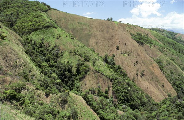 DOMINICAN REPUBLIC, San Juan Province, Landscape, Hillside with deep gulleys caused by erosion.