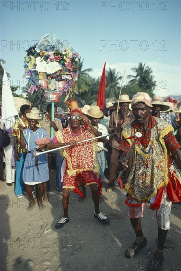 HAITI, Religion, Voodoo Ra Ra dancers. The Voodoo years comes to a climax at Lent and Easter