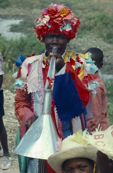 HAITI, Religion, Voodoo priest at Ra Ra dance. The Voodoo years comes to a climax at Lent and Easter