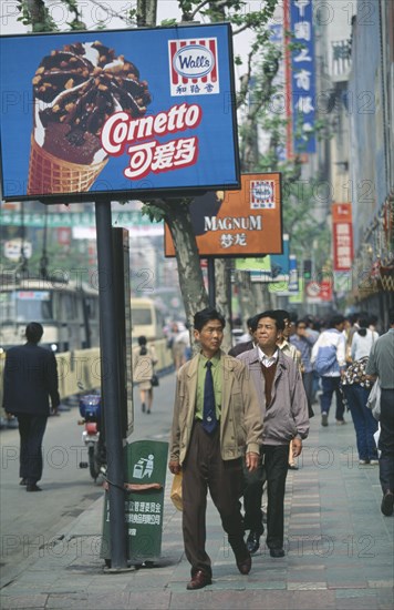 CHINA, Shanghai, Western ice cream advertising on Nanjing Donglu