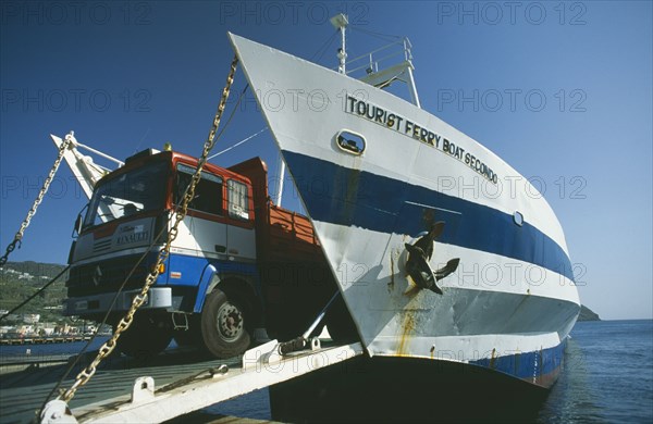 ITALY, Aeolian Islands, Lipari Island, Lorry leaving car ferry at the harbour of Lipari