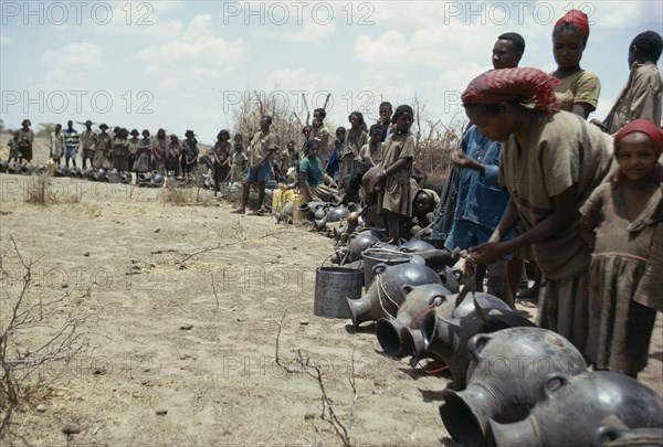 ETHIOPIA, Water, Galla people waiting for water during drought.