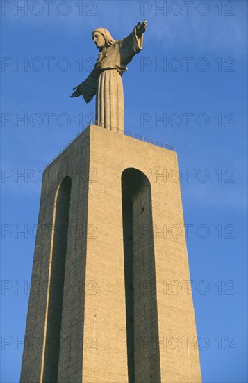 PORTUGAL, Lisboa, Lisbon, Towering monument of Christo Rei which stands overlooking the Tagus River