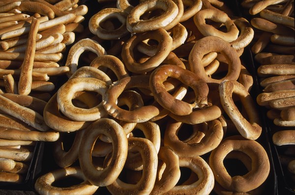 EGYPT, Nile Valley, Luxor, Trays piled with bread sticks and rings.