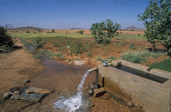 INDIA, Andhra Pradesh, Anantapur, Ground water irrigating dry field on hilltop