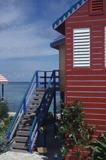 WEST INDIES, Bahamas, Nassau, Compass Point.  Architectural detail showing roof vent and window shutters.