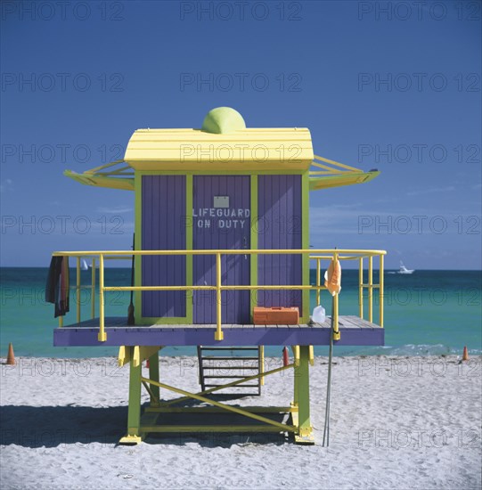 USA, Florida, Miami, Brightly coloured Art Deco style Life Guards hut on Miami Beach