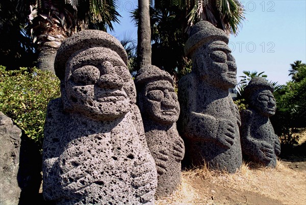 SOUTH KOREA, Cheju do Island, Tolharubang grandfather stones carved from lava rock which are guardians of the gates to Chejus ancient towns