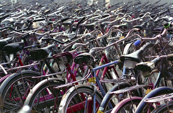 CHINA, Henan, Luoyang, View over mass of bicycles in the City Bike park