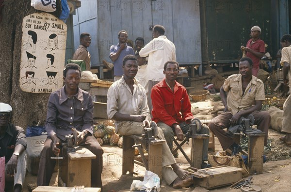 GHANA, Kumasi, Knife grinders