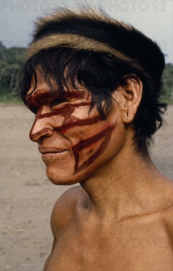 ECUADOR, People, Men, Portrait of Shuar Indian man with painted face. Tribe also known as Jivero and Jibaro