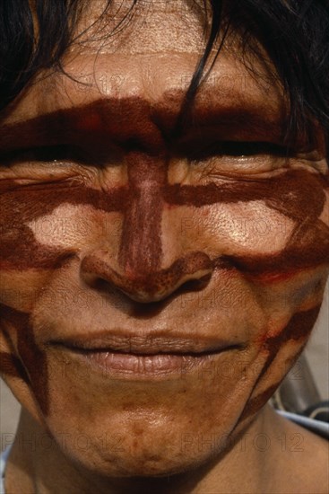 ECUADOR, People, Men, Portrait of Shuar Indian man with painted face. Tribe also known as Jivero and Jibaro