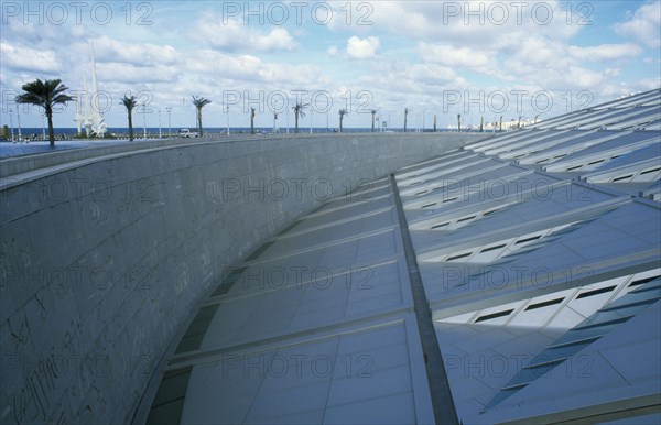 EGYPT, Nile Delta, Alexandria, Rooftop view of the Library which has been resurrected on the site of the Bibliotheca Alexandrina with scripts of the worlds major civilizations engraved on the walls