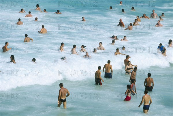 AUSTRALIA, New South Wales, Sydney, Bathers in the sea at Tamarama beach