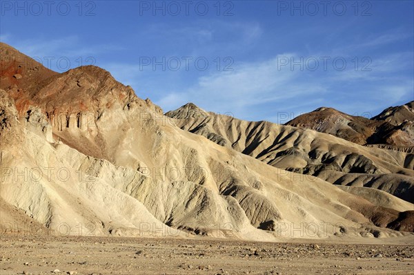 USA, California, Death Valley, View toward layered sculpted rock hills