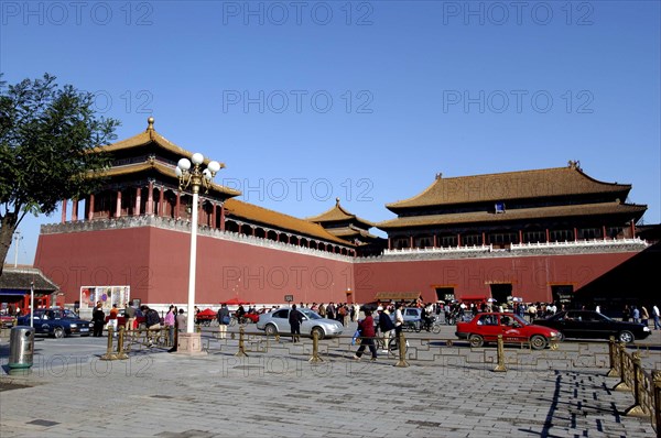 CHINA, Beijing, Forbidden City, Exterior view of a section of the Meridian Gate with passing traffic