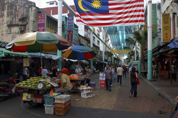 MALAYSIA, Kuala Lumpur, Chinatown, View along a market street lined with stallls