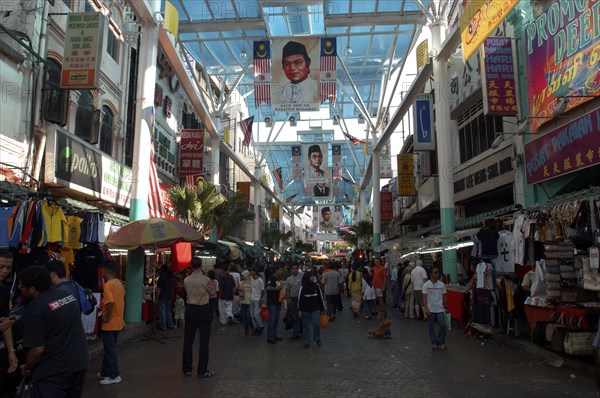 MALAYSIA, Kuala Lumpur, Chinatown, View along a covered market street lined with stallls