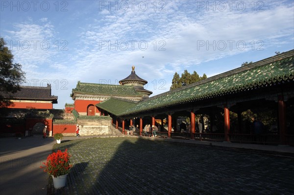 CHINA, Beijing, Tiantan Park, aka The Temple of Heaven. View of the red and green rooved architecture within the complex