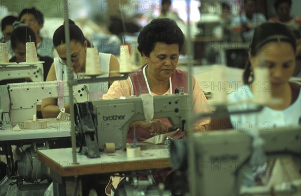 SOUTH AFRICA, Western Cape, Cape Town, Female sewing machine operators at Pre Les bedroom textiles factory