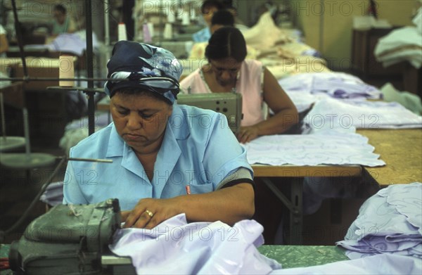 SOUTH AFRICA, Western Cape, Cape Town, Female sewing machine operators at Pre Les bedroom textiles factory