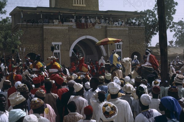 NIGERIA, Katsina, Salah Day marking the end of Ramadan.  Crowds surrounding the Emir and his retinue as he returns to his palace.