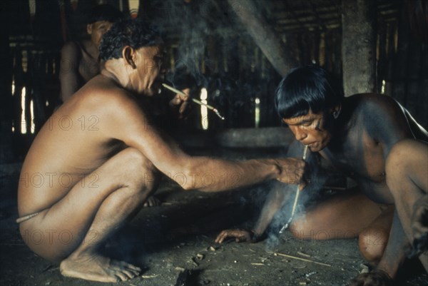 BRAZIL, Amazonas, Xingu, Smoking ritual of Mehinacu men