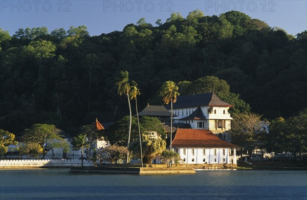 SRI LANKA, Kandy, Temple of the Tooth aka Dalada Maligawa. View over river toward the Buddhist Temple