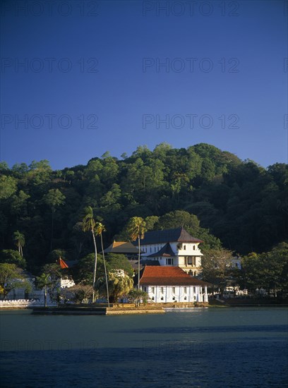 SRI LANKA, Kandy, Temple of the Tooth aka Dalada Maligawa. View over river toward the Buddhist Temple