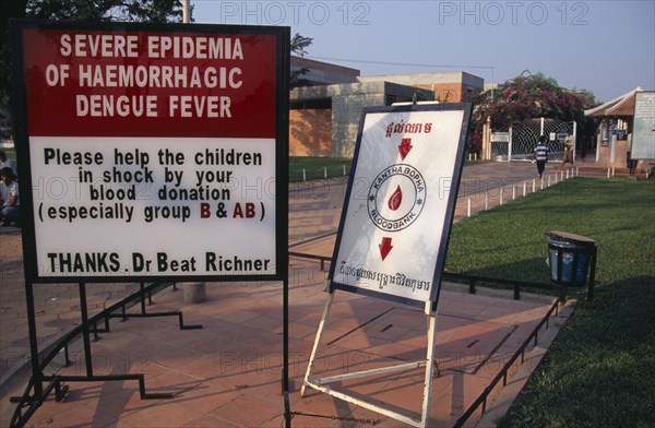 CAMBODIA, Siem Reap, Sign outside the Childrens Hospital asking for blood donations due to a severe epidemic of haemorragic dengue fever