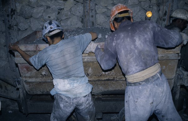 BOLIVIA, Potosi, Cerro Rico, "Rosaria mine.  Mining for tin and silver, miners working underground."