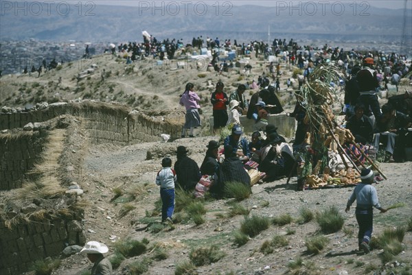 BOLIVIA, La Paz, All Souls Festival.  Crowds in graveyard above La Paz.