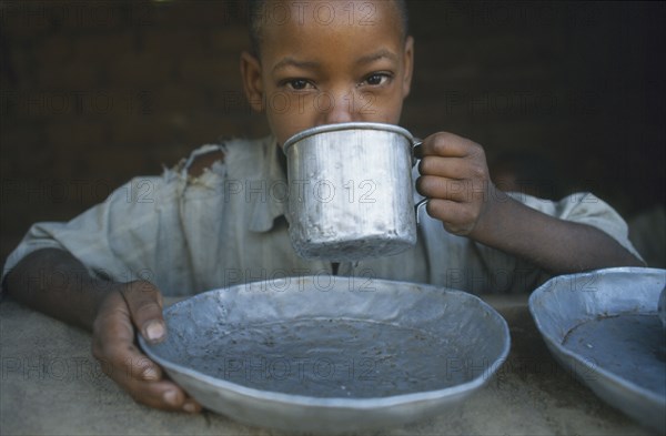 TANZANIA, Singida, Kititimo Centre.  Breakfast at school for street  children.