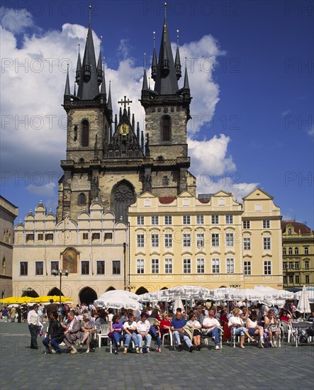 CZECH REPUBLIC, Stredocesky, Prague, Stare Mesto or Old Town Square. Crowds of people sitting at cafes overlooked by Tyn Church.