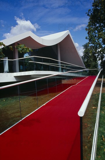ENGLAND, London, Kensington Gardens.  The Serpentine Gallery Pavilion designed by architect Oscar Niemeyer.  Exterior view.