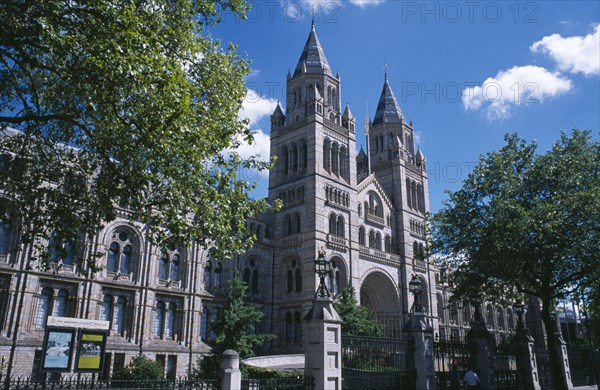 20059172 ENGLAND  London Kensington. Natural History Museum. Exterior view framed by trees.