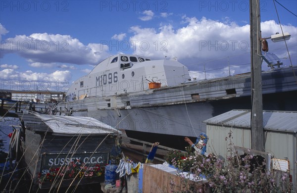 20059198 ENGLAND West Sussex Shoreham by Sea Ex Naval houseboat moored on the river Adur.