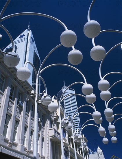 AUSTRALIA, Western Australia, Perth, Angled view looking upwards through street lamps on Hay Street