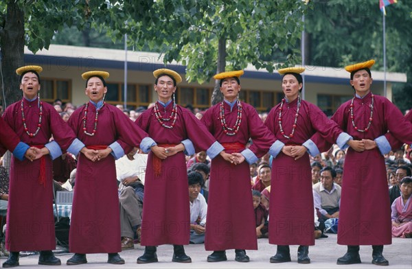 INDIA, Himachal Pradesh, Festivals, Tibetans in traditional costume celebrating the birthday of the Dalai Lama.