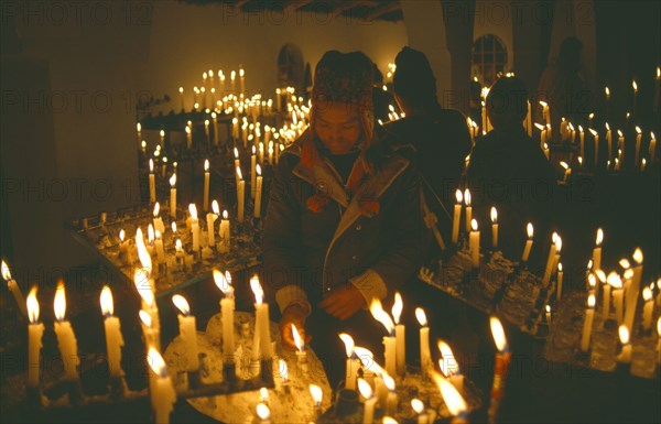 PERU, Cusco, Vilcanota Mountains, Ice Festival of Qoyllur Riti.  Pre Columbian in origin but of Christian significance today.  Worshippers at candlemass ceremony.
